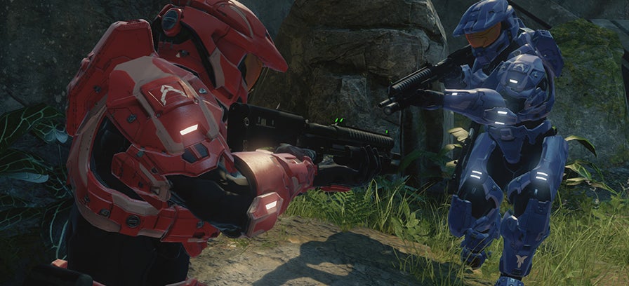 Red and blue team members from Halo 2 pointing guns at each other