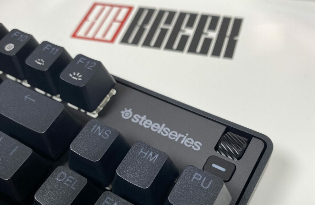 Scroll wheel and media button close-up on the SteelSeries Apex 9