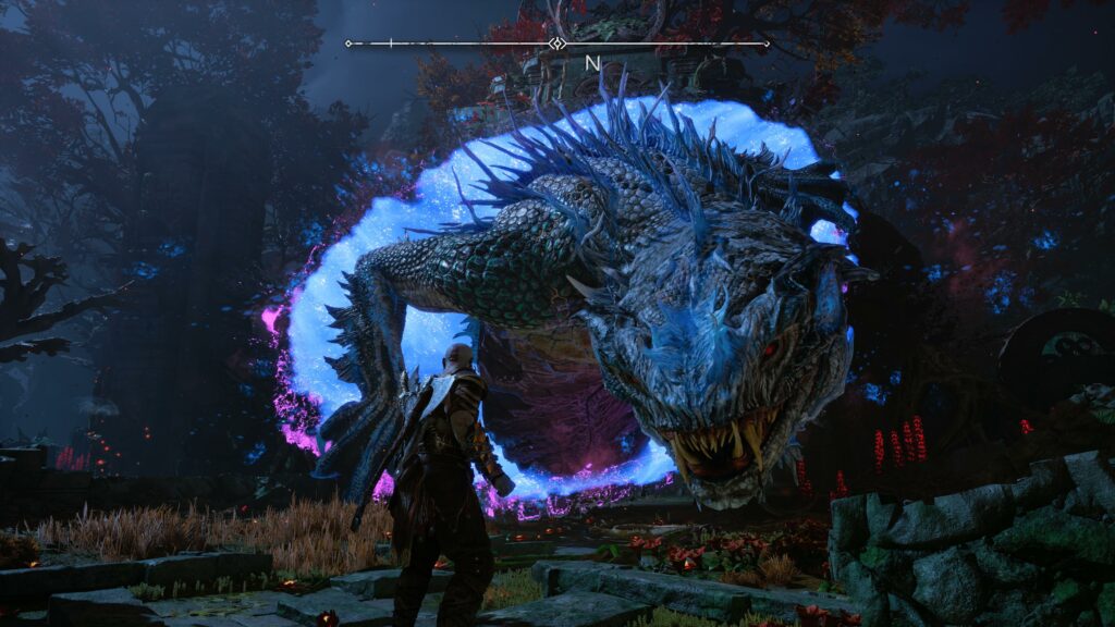 Fighting a giant creature, in true God of War fashion.