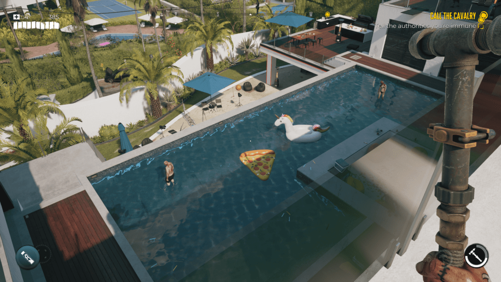 Luxury pool with pizza and unicorn float.