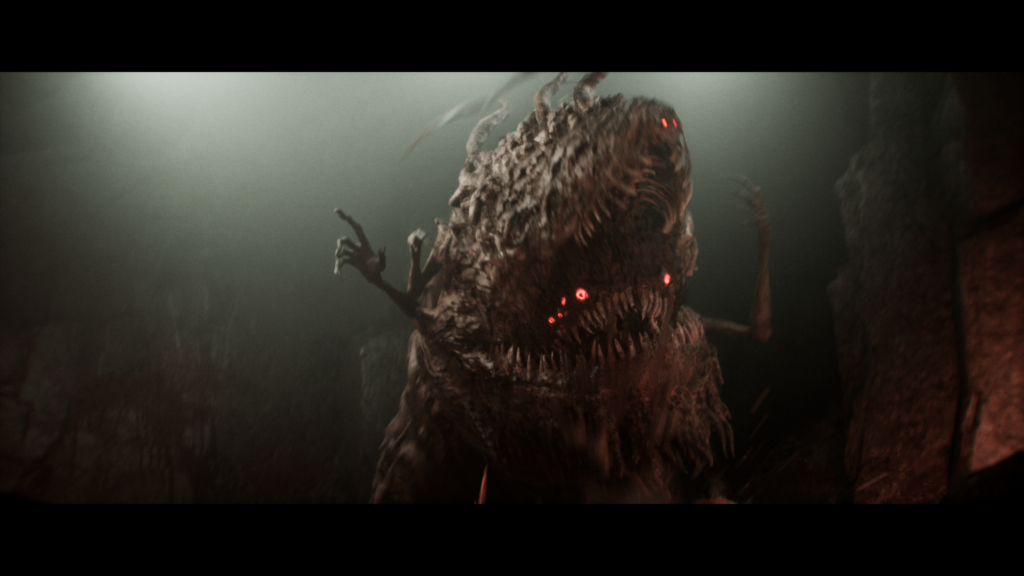 Some creepy horror boss with a huge jaw within a jaw filled with teeth, more arms than anything should have and a big blob of tendrilly flesh.