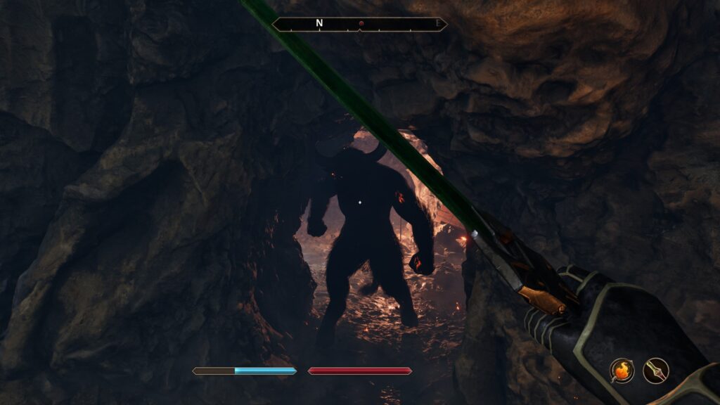Fighting inside a cave, a huge minotaurus standing in the hallway, only his silhouette visible due to the fire burning from his back.