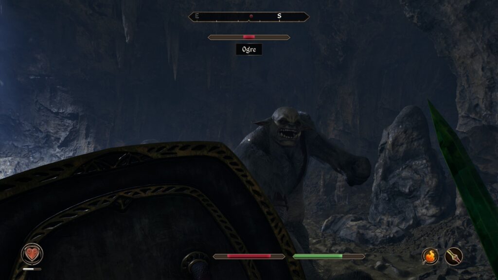 An ogre attacks, gray ugly creature with a huge fist barreling towards the player, shield raised and sword in defensive position.